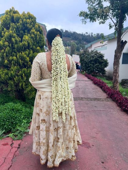 A full-length view of the jasmine cascade hairstyle, showing its incredible length and beauty.