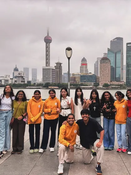 The bonds we build off the court make us stronger on it. Our girls' team enjoying the stunning Shanghai skyline at The Bund, creating memories that last a lifetime.