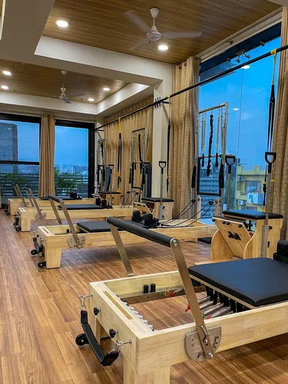 The warm wooden floors and thoughtful layout of our studio create a welcoming and serene environment. This is a space where you can leave the stress of the day behind and focus on your well-being.