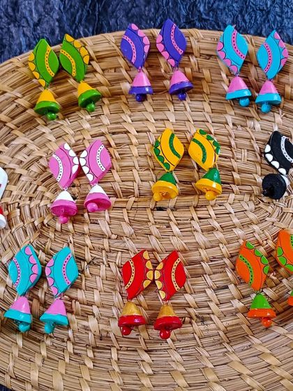 A duplicate image of the colorful paisley and jhumka danglers.