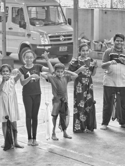 Another group of proud students from a puppet class. Each puppet is unique, reflecting the personality of the child who made it.
