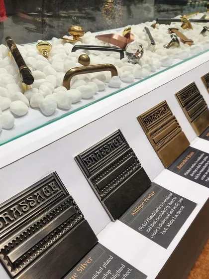 At my IndiaWood 2024 booth, I displayed a comprehensive range of my finish samples. Each sample is clearly labeled, explaining the process behind finishes like Antique Pewter and Burnished Brass, giving visitors insight into my craft.