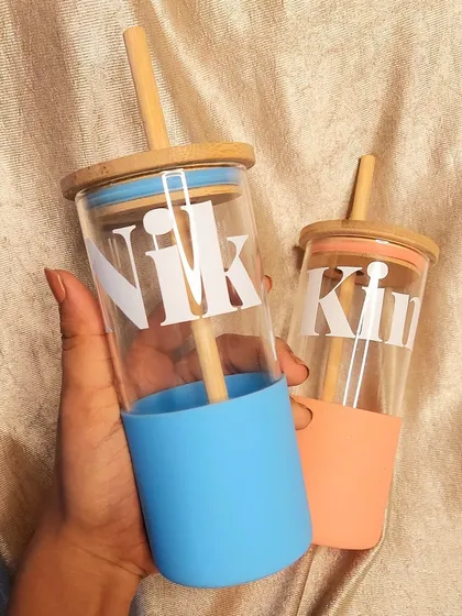 His and hers personalized sippers. These glass tumblers are available in different colors and are a great gift for couples.