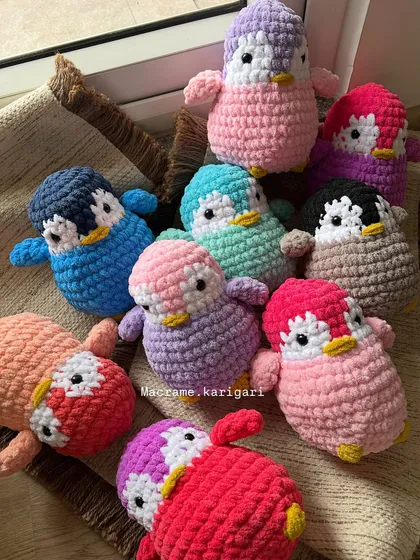More of our adorable handmade penguins, ready to be packed for new homes. We make these in a rainbow of colors to suit any preference.