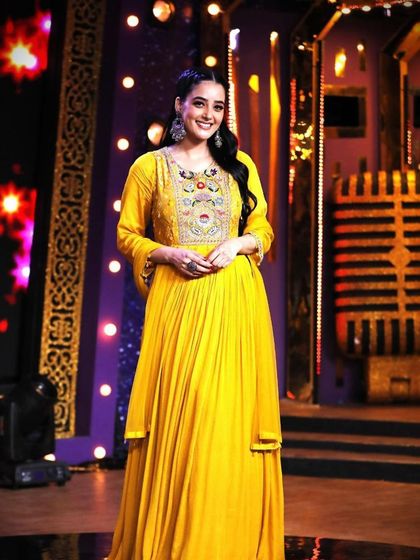 My exquisite designs featured on PTC Punjabi. This yellow Anarkali is a perfect example of tradition with a modern twist.
