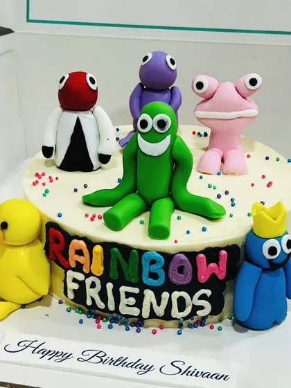 All the Rainbow Friends have gathered for Shiyaan's birthday! Each character is hand-molded from fondant, making this a colorful and fun centerpiece for any fan.