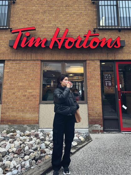 A shot outside a Tim Hortons, a quintessential Canadian student experience.