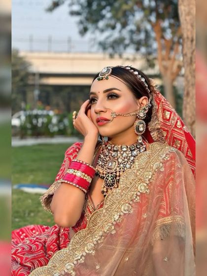 Another beautiful portrait of the bride. The makeup is flawless and the jewelry is stunning.