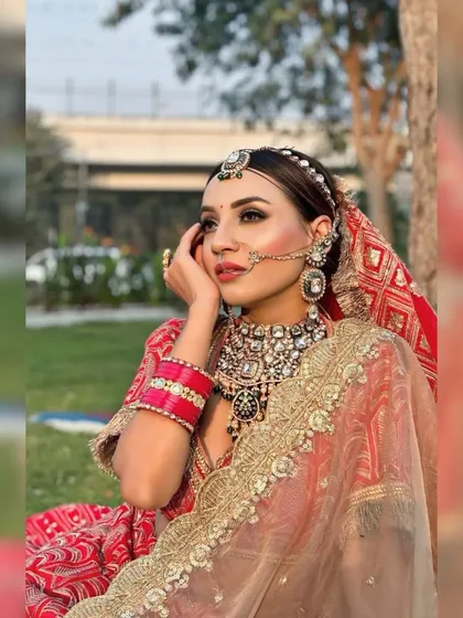 Another beautiful portrait of the bride. The makeup is flawless and the jewelry is stunning.