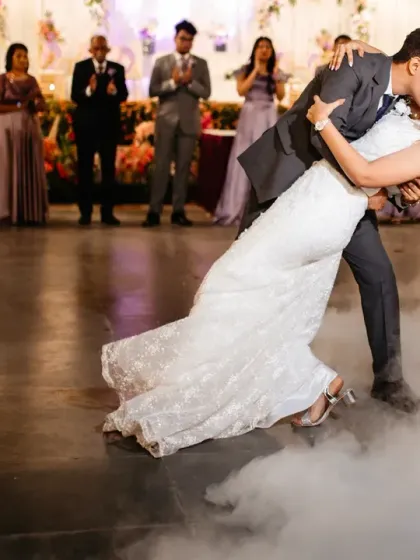 A dramatic dip and kiss during the first dance, surrounded by a cloud of dry ice. This is a classic, romantic shot that always looks stunning.