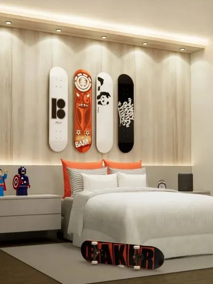 A skateboard-themed bedroom for a teen. The design uses actual skateboards as wall art, creating a cool and personal feature wall.