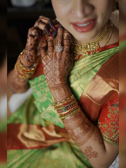 A close-up of the baby shower mehendi, showing the intricate patterns and the rich color of the organic henna.