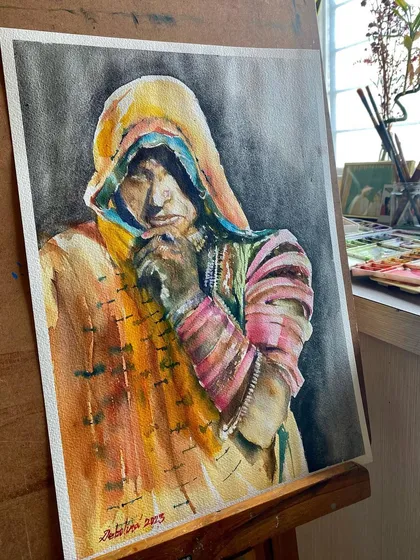 I am fascinated by the vibrant culture and people of India. This watercolor portrait of a Rajasthani woman, with her colorful attire and graceful presence, is part of a series where I explore the beauty and stories of the faces I encounter.
