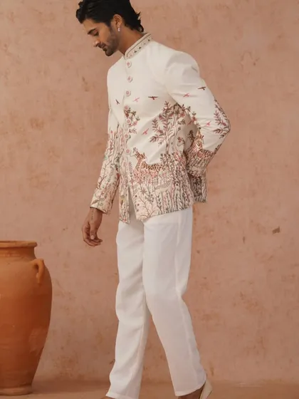 A gallery of our Jodhpuri and Indo-Western designs, showing the variety of fabrics, embroidery styles, and custom fits available for your special occasion.