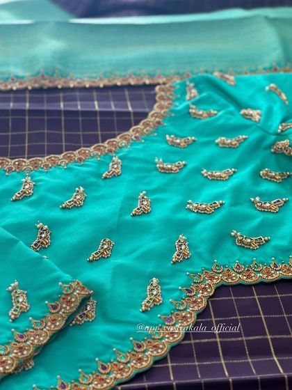The back of the turquoise buti blouse.