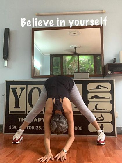 A wide-legged forward bend with an encouraging message. Believing in yourself is the first step to achieving any posture.