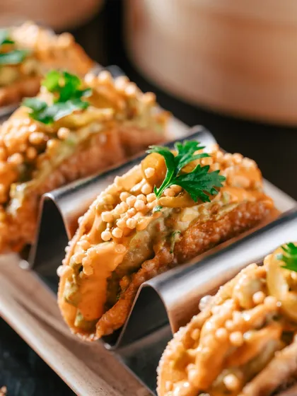 This golden, Nikkei-kissed taco is filled with creamy avocado and topped with crunchy pearls, bringing bold flavour and serious crunch to your appetizer spread.