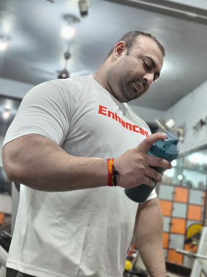 Don't complain, enjoy the pain. Taking a moment to refuel with my shaker after a tough workout.