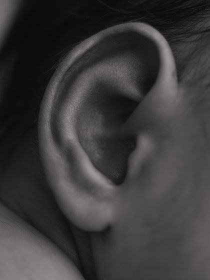The perfect swirl of a tiny ear. I love capturing these small, intricate details in black and white to create timeless, artistic portraits.