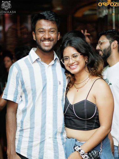 A happy couple enjoying the party.