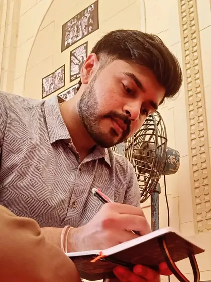 Here I am, completely absorbed in the process of live drawing at a Durga Pooja celebration. Finding a quiet corner, I focus on observing and translating the details and the mood of the event into my sketchbook using my trusted ballpoint pen.