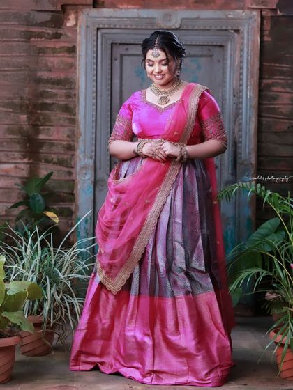 A candid moment of laughter and joy. The bride's natural expression is the focus of this beautiful portrait.