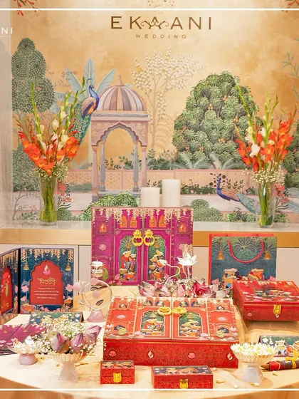 I designed this display to showcase the full splendor of the Pichwai collection. Centered around a magnificent invitation box, the suite includes coordinated stationery, gift bags, and smaller favor boxes, all adorned with the timeless, devotional art of Pichwai.