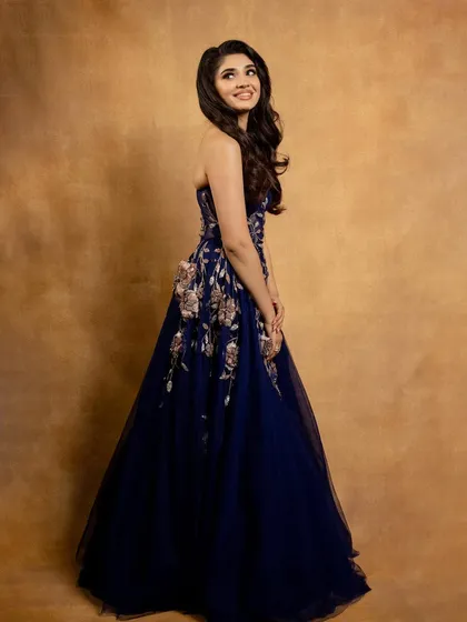 I styled the lovely Krithi Shetty for the Galatta awards in Chennai. This strapless navy blue tulle gown with floral embroidery creates a fairytale moment, perfect for a grand awards night.
