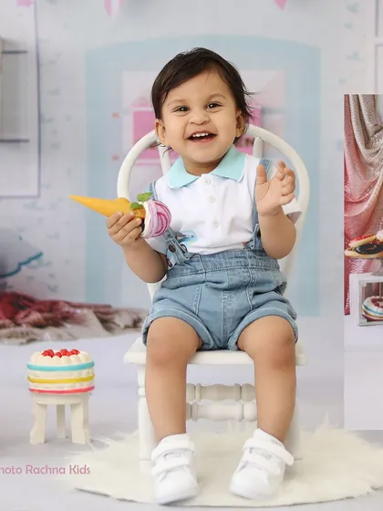 A happy smile from the same candy shop session, perfect for capturing the sweet and playful nature of toddlers.