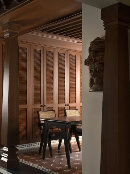 A view of the dining area, framed by the Chettinad pillars.