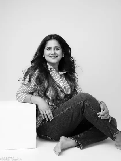 Another take from our minimalist session, this black and white portrait is clean, classic, and full of genuine warmth. It proves that you don't need fancy props to shine.