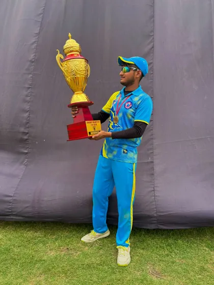 Our Player of the Tournament, Sunny Tyagi, with the trophy.