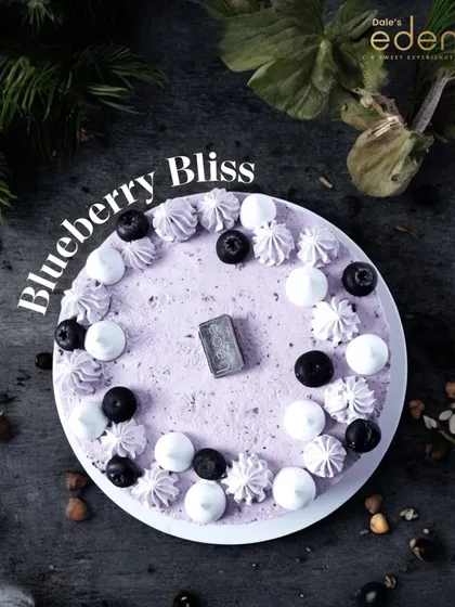 Blueberry Bliss. An aerial view of our beautifully decorated blueberry cheesecake, topped with fresh berries and meringue kisses.