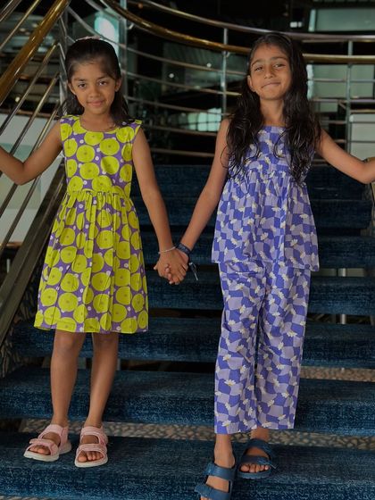 Best friends or sisters, twinning is always fun! These two girls are looking adorable in our simple, playful cotton frocks, perfect for a day out.