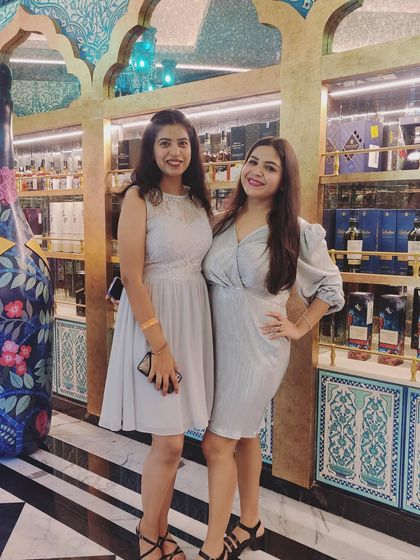 Another picture from the office party with a colleague. It's great to see everyone's personal style come out during these events.