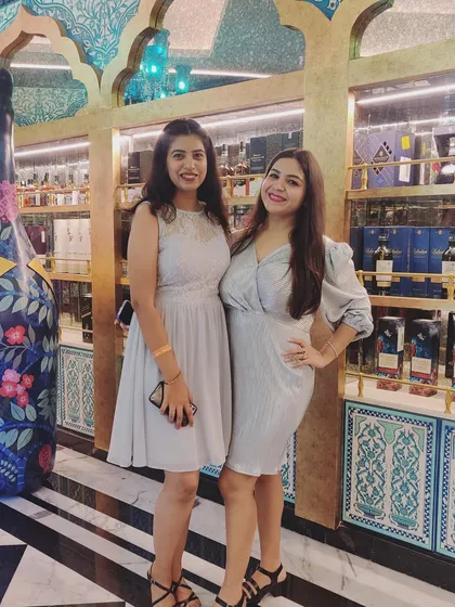 Another picture from the office party with a colleague. It's great to see everyone's personal style come out during these events.