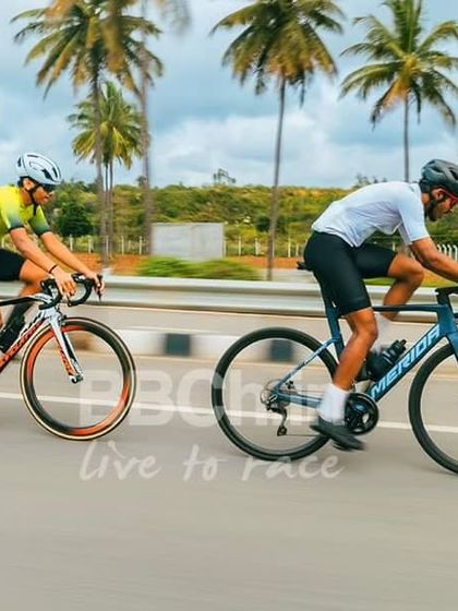 Two riders working together, sharing the effort of battling the wind. This kind of cooperation is essential in road racing.