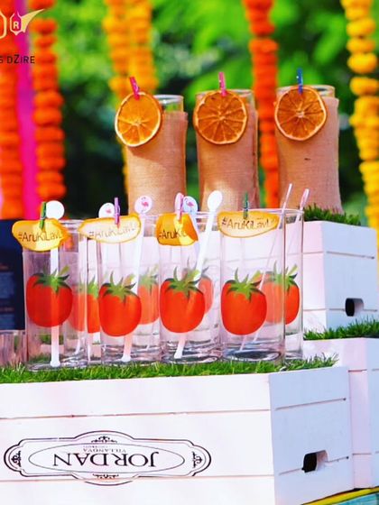 Why serve a Bloody Mary in a plain glass? For this lunch event, we used these fun glasses printed with tomatoes and served them with dehydrated orange garnishes and personalized stirrers.