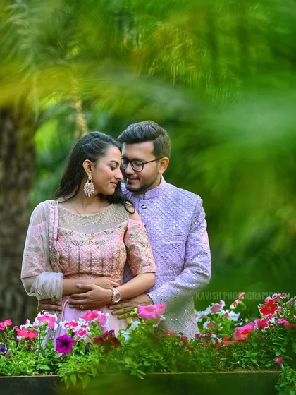 A close-up of the couple in a garden setting, with the focus on their loving gaze and the beautiful natural surroundings.