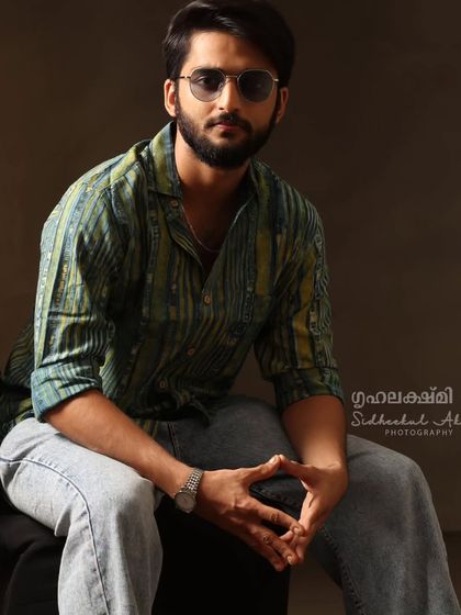 A portrait from the Grihalakshmi shoot with 'Aadujeevitham' actor Gokul. We styled him with a casual, modern look.