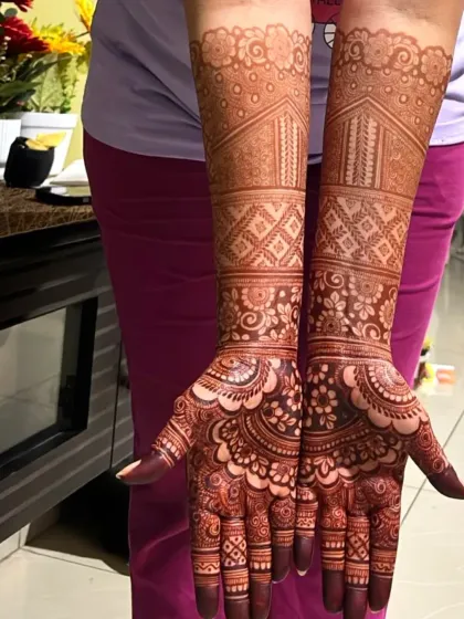 Here is the same Indian bridal design after the henna paste has dried and the stain has started to develop. You can see the beautiful reddish brown color coming through.