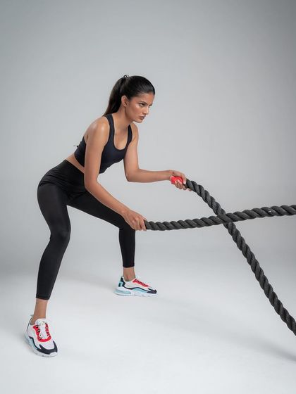 An action shot for activewear brand Druscilla Fashion. We provided the space and technical setup for capturing dynamic fitness photography, complete with props like battle ropes.