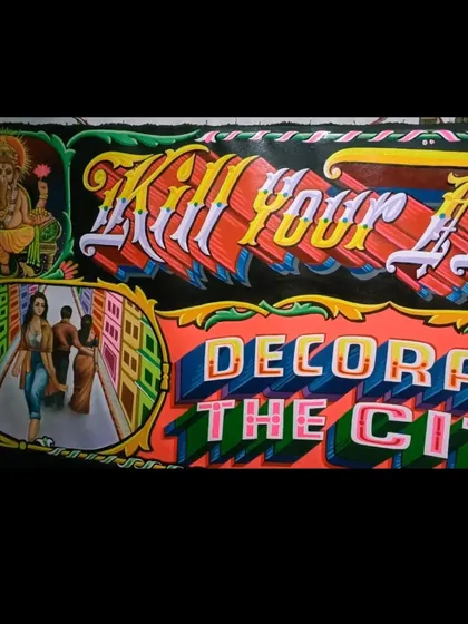 A detail of the "Kill Your Television" sign.