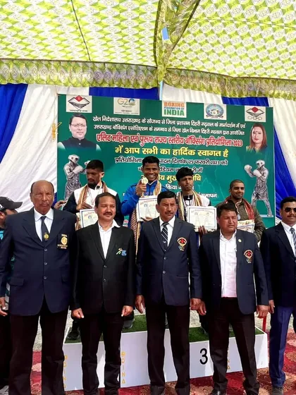 On the podium with my fighter Rahul after he won the gold medal at the Uttarakhand Senior Boxing Championship.