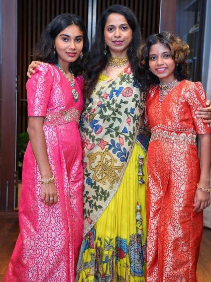 My prestigious client looks absolutely beautiful flaunting this mythological concept Kalamkari lehenga. The vibrant yellow skirt is hand-painted with intricate scenes, and I've paired it with a full-sleeve blouse and a contrasting dupatta.