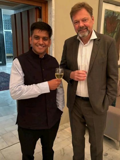 Sharing a moment with a diplomat at the event hosted by the German Ambassador. Building international connections is an integral part of understanding global legal and political landscapes.