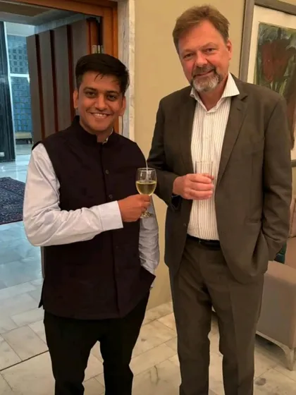 Sharing a moment with a diplomat at the event hosted by the German Ambassador. Building international connections is an integral part of understanding global legal and political landscapes.