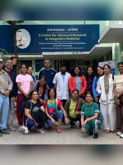We believe in a research-backed approach to yoga. This photo shows our team during a visit to Anvesana, the Centre for Advanced Research in Integrative Medicine at SVYASA University, reflecting our commitment to bridging ancient wisdom with modern scientific understanding.