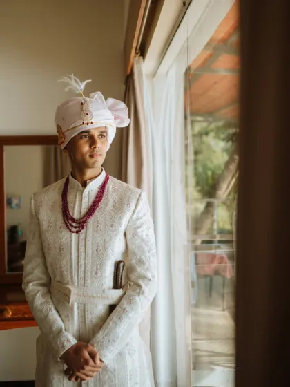 A classic portrait of the groom, moments before the ceremony begins. I capture these quiet, reflective moments to tell the complete story of your wedding day.