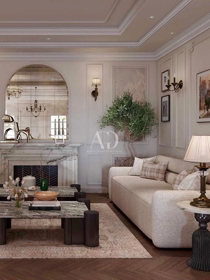 The living area in "Villa no. 185" is designed for comfort and style. The olive tree adds a touch of nature, while the mix of modern sofas and a classic fireplace creates a balanced and inviting space.